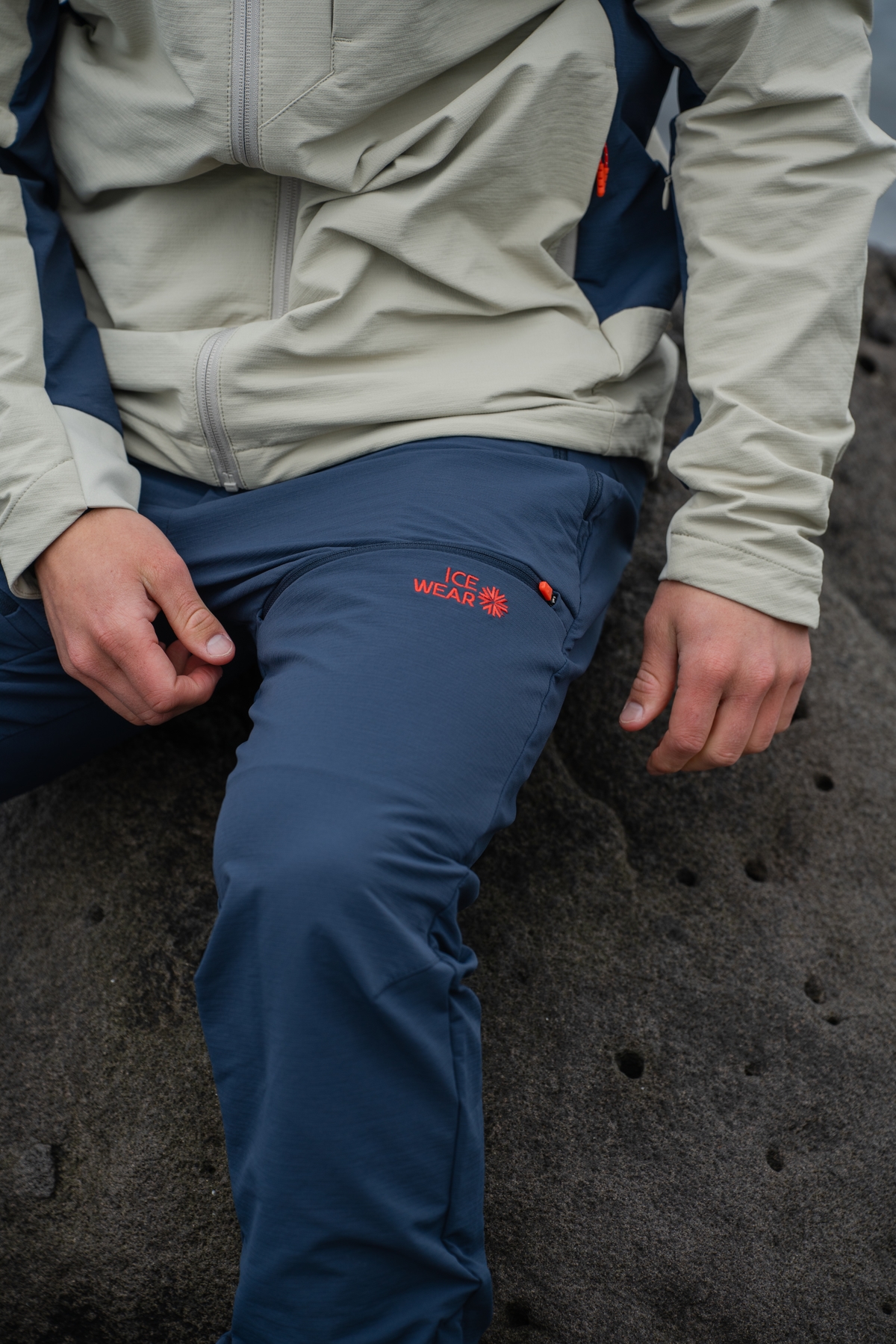 blue-pants-white-jacket-rock.jpeg