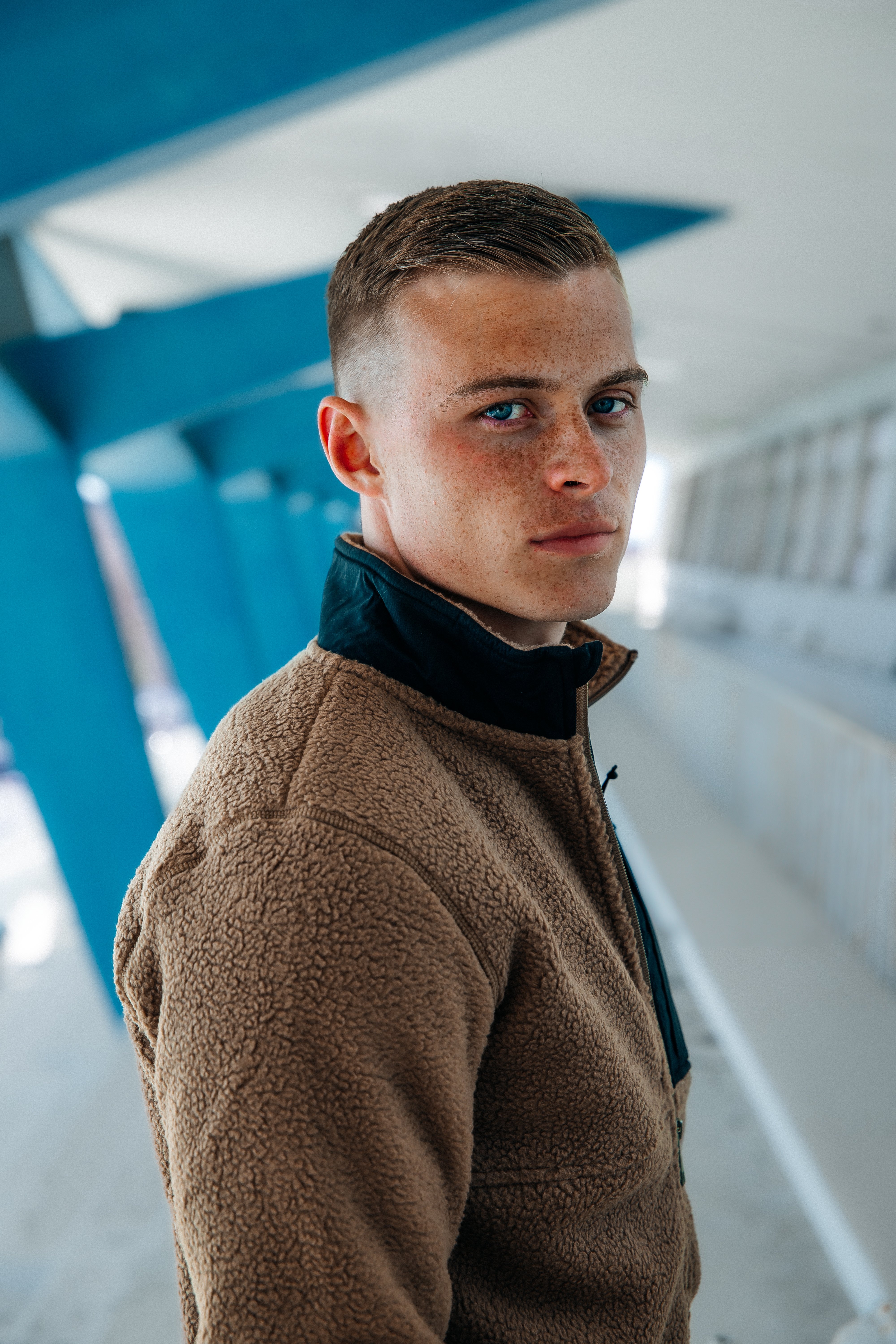 man-brown-sweater.jpeg