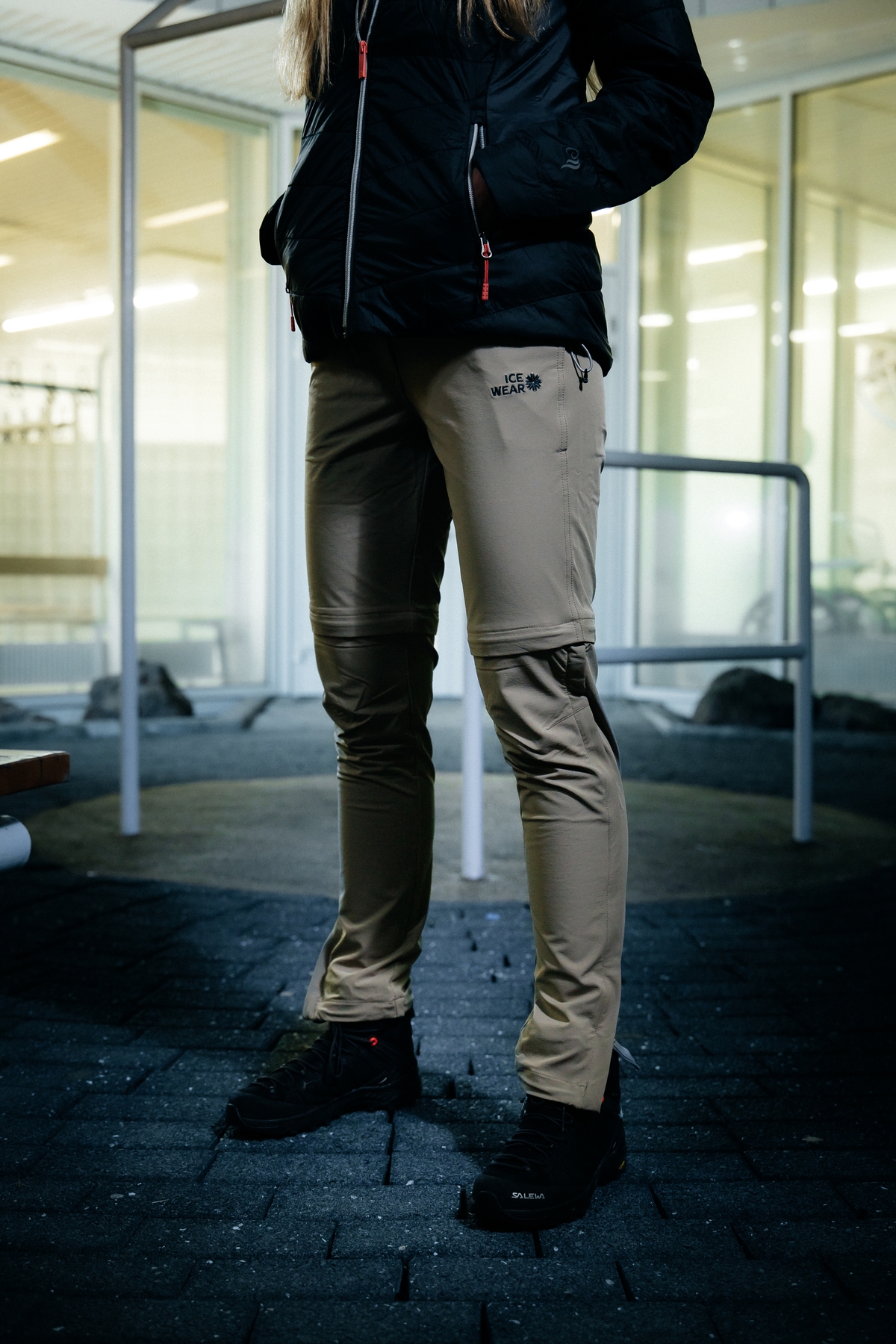 woman-lightbrown-pants-black-jacket.jpeg