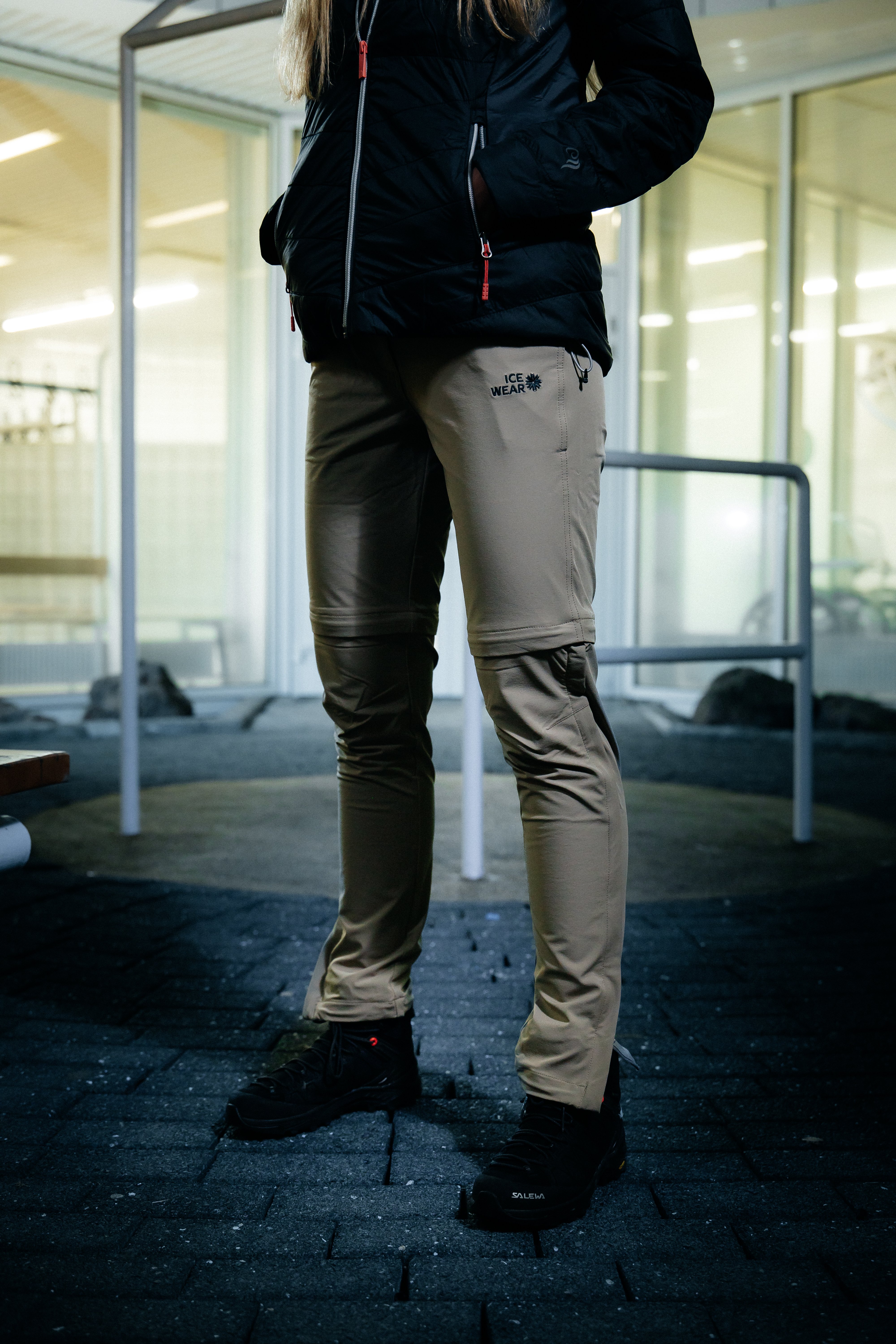 woman-lightbrown-pants-black-jacket.jpeg