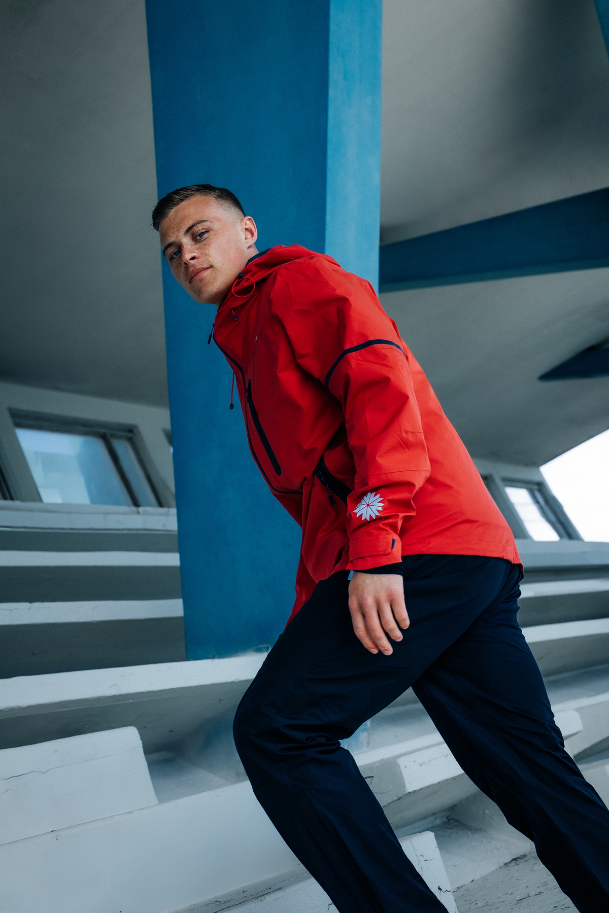 man-red-jacket-light-pants.jpeg