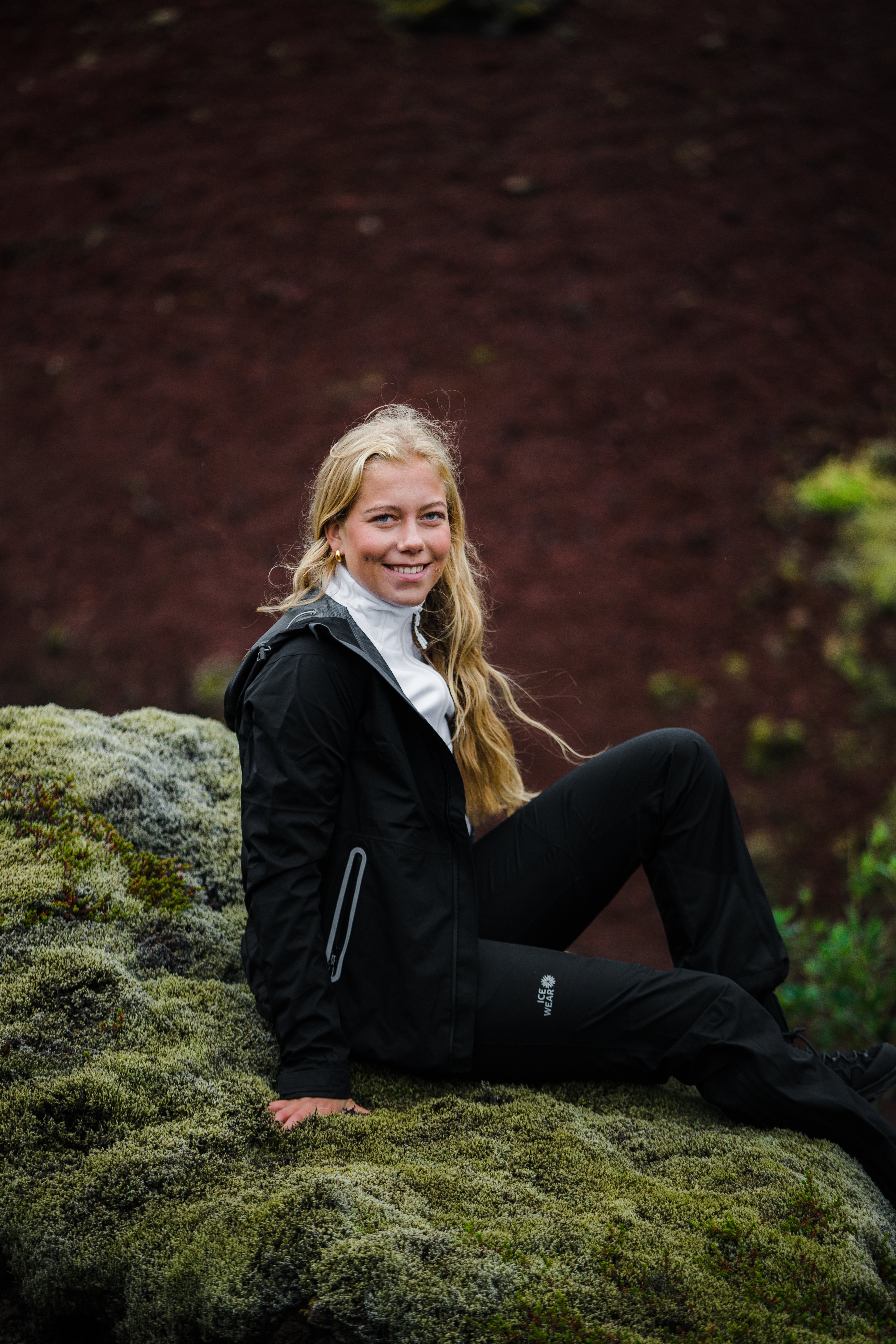 woman-black-light-jacket-white-sweater-1.jpeg