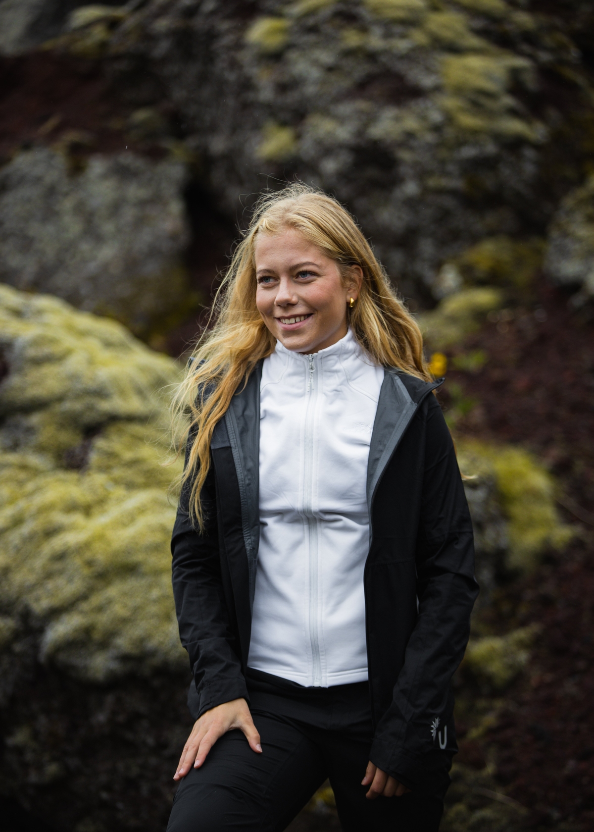 woman-black-light-jacket-white-sweater-12.jpeg